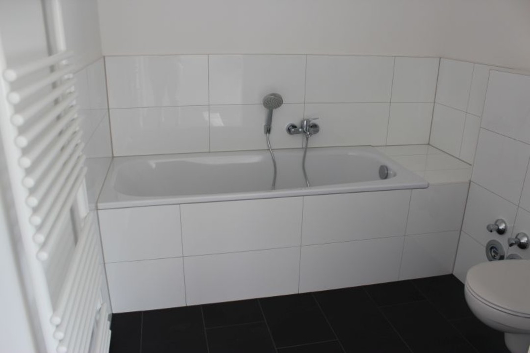 Einzigartig! Kernsanierte 4 Zimmer Wohnung mit Dachgarten in fußläufiger Innenstadtlage!